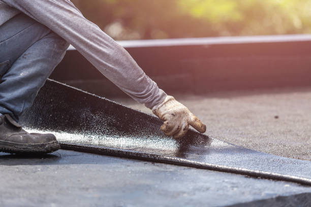 Professional Basement Waterproofing technician working in Alloway, NJ
